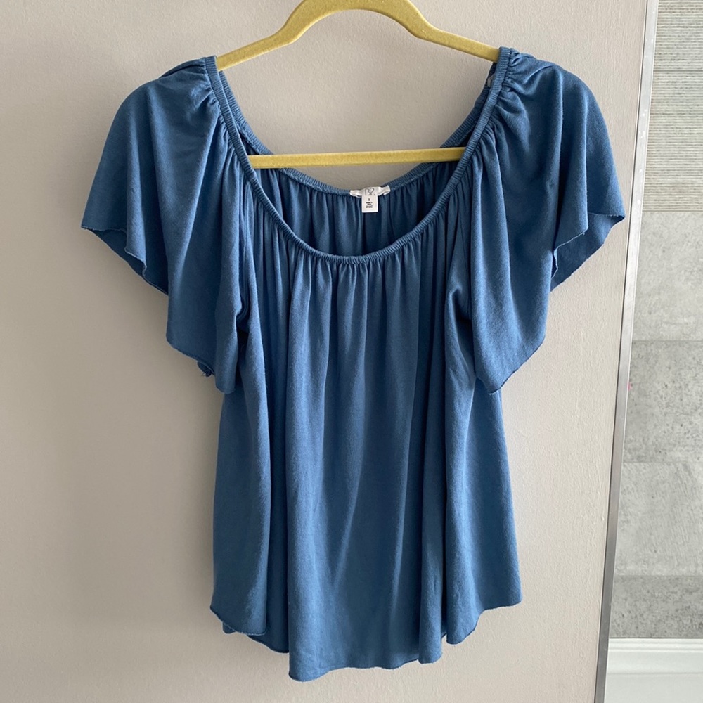 Over the shoulder blue top